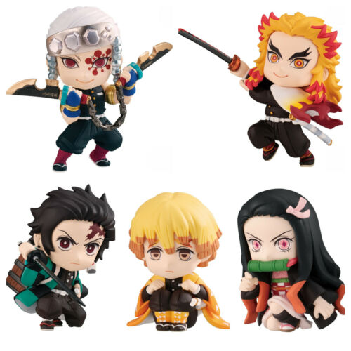 Demon Slayer Figure Set. Tengen Uzui, Kyojuro Rengoku, Tanjiro Kamado, Zenitsu Agatsuma, and Nezuko Kamado.